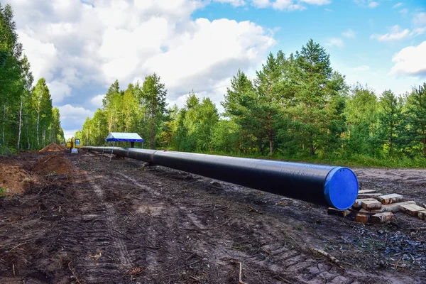 Construction Gas Pipeline Project. Natural Gas and Crude oil  Transmission in pipe to LNG plant (shipped by LPG tanker). Building of transit petrochemical pipe in forest area. Pipes Welding