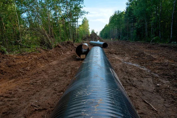 Construction Gas Pipeline Project. Natural Gas and Crude oil  Transmission in pipe to LNG plant (shipped by LPG tanker). Building of transit petrochemical pipe in forest area. Pipes Welding