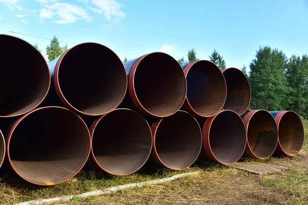 Pipes for natural gas pipeline project. Oil and gas pipelines. Fuel and energy concept. Oil pipeline that would carry tar sands for oil refineries. Fossil fuels and crude