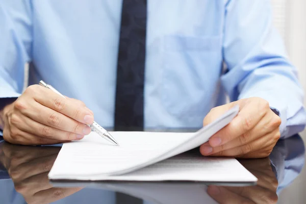 Businessman is checking final price in contract — Stock Photo, Image