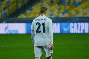 Real Madrid 'den Martin Odegaard, 1 Aralık 2020 tarihinde Kyiv Olimpiyskiy Stadyumu' nda Shakhtar Donetsk ile Real Madrid arasında oynanan UEFA Şampiyonlar Ligi B Grubu futbol karşılaşmasında.