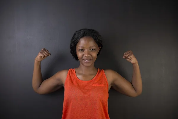 South African or African American woman with healthy strong arm muscles for success — Stock Photo, Image