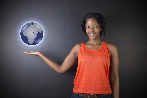 South African or African American woman teacher or student holding world earth globe — Stock Photo, Image