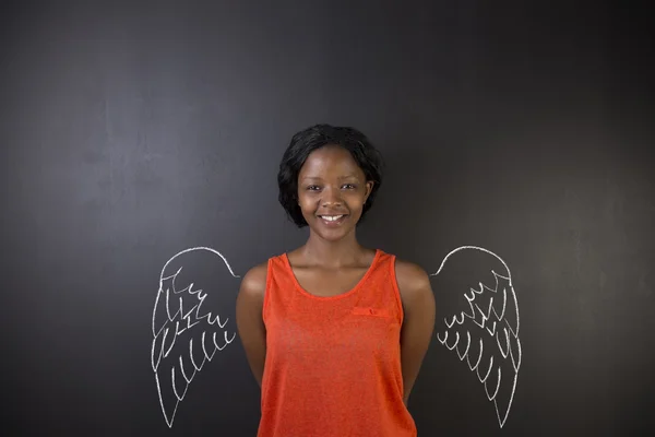 Mujer sudafricana o afroamericana maestra o ángel estudiante con alas de tiza —  Fotos de Stock