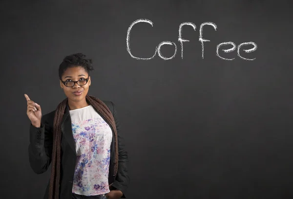 African woman good idea about coffee on blackboard background — Stock Photo, Image