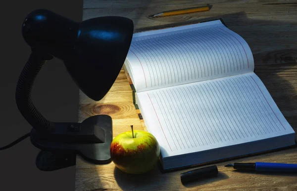 Notebook Illuminating Dark Table Lamp — Stock Photo, Image