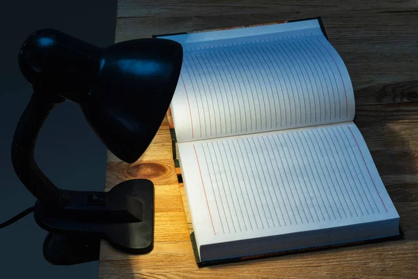 Table Lamp Illuminating Pitch Darkness Notebook — Stock Photo, Image