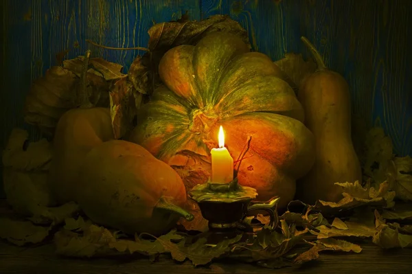 Pumpkins lit candle — Stock Photo, Image