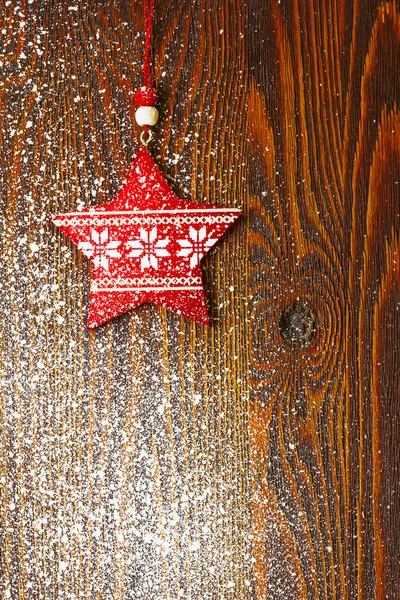 Estrella de Navidad y tabla cubierta de nieve — Foto de Stock