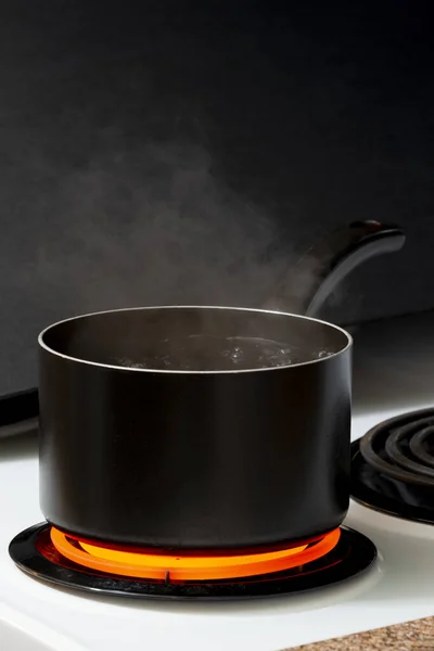 Boiling Pot of Water on Stove With Copy Space Stock Photo by ©whitestar1955  275925416