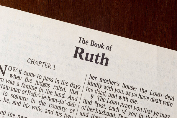 This is the King James Bible translated in 1611.  There is no copyright.  A razor-sharp macro photograph of the first page of the book of Ruth.