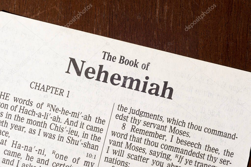 This is the King James Bible translated in 1611.  There is no copyright.  Macro photo of the title page of Nehemiah.