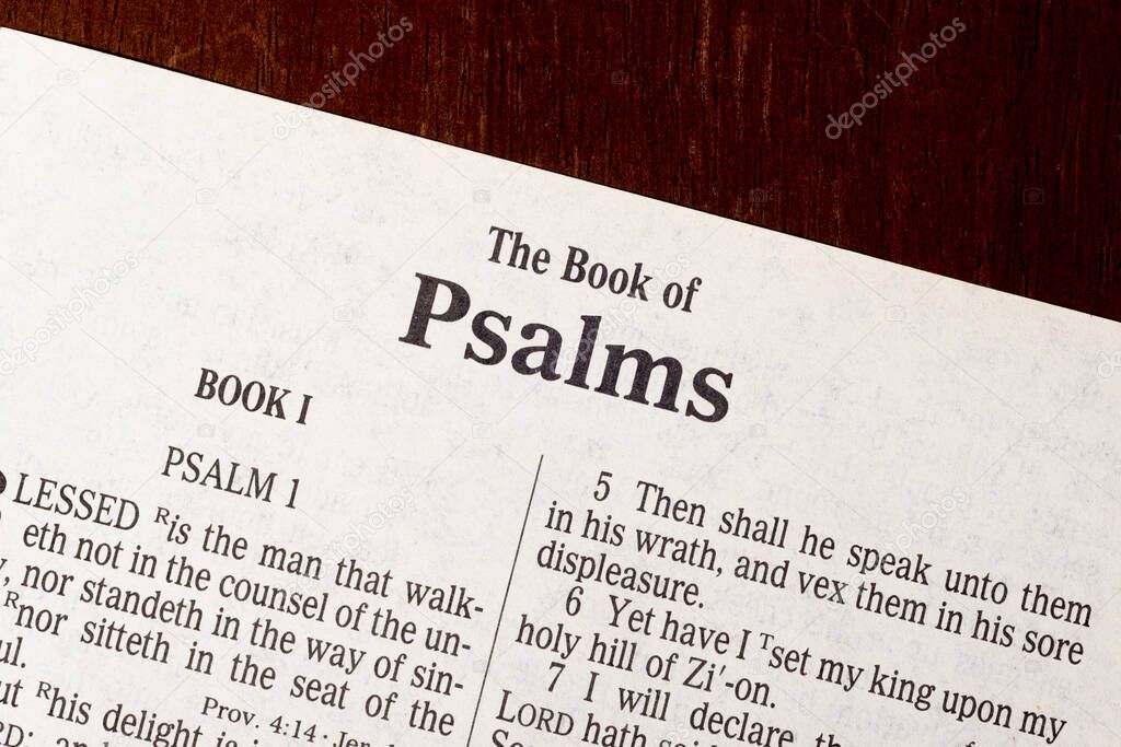 This is the King James Bible translated in 1611.  There is no copyright.  Macro photo of the title page of Psalm
