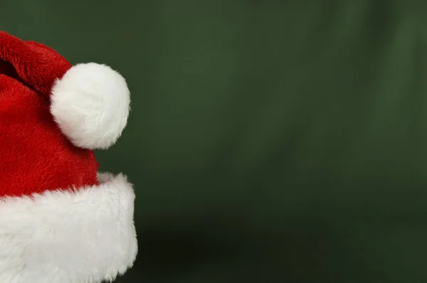 Santa Hat On Green Background — Stock Photo, Image