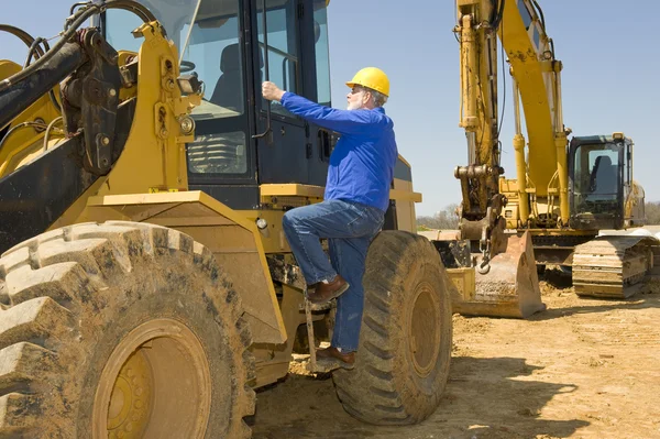 Equipment Operator Climbing Into Cab — Stock Photo, Image