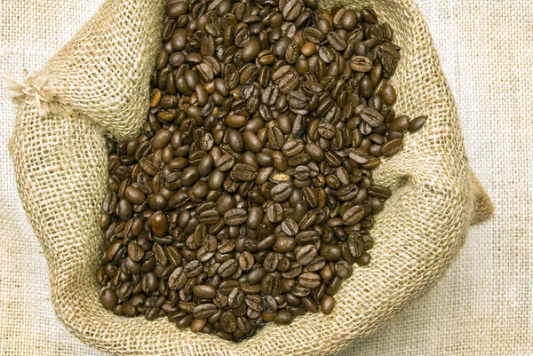 Burlap Bag Full Of Coffee Beans — Stock Photo, Image