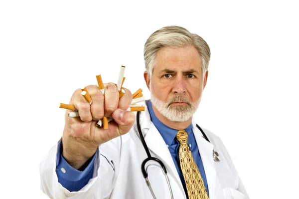 Doctor Crushing Cigarettes — Stock Photo, Image