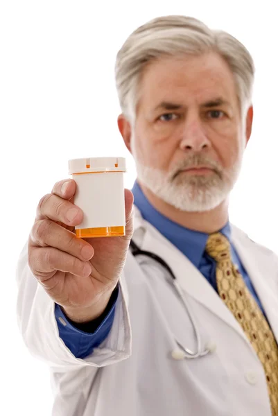 Arzt mit unbeschrifteter Rezeptflasche — Stockfoto
