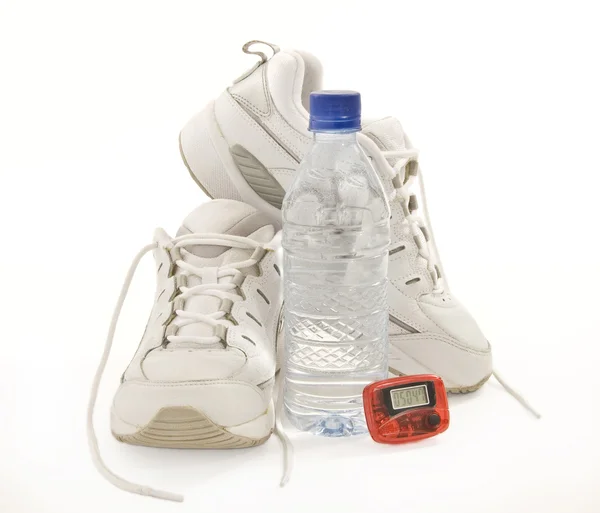 Pair Of Running Shoes With Water Bottle And Pedometer — Stock Photo, Image