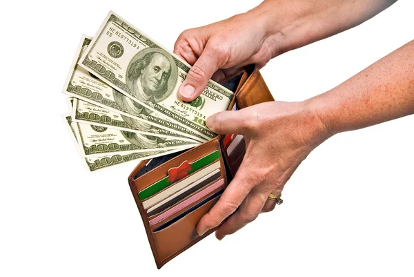 Handen geld uit portemonnee trekken — Stockfoto