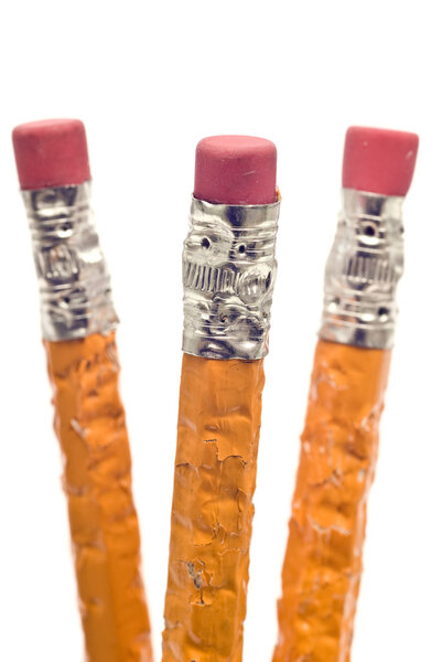 Chewed Pencils On White Background