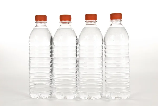 Bottles Of Water With Red Lid — Stock Photo, Image