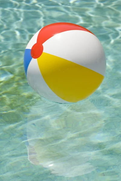 Beach Ball Floating In Swimming Pool Vertical — Stock Photo, Image