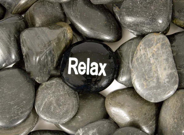 Поощрение камень, говорящий расслабиться — стоковое фото