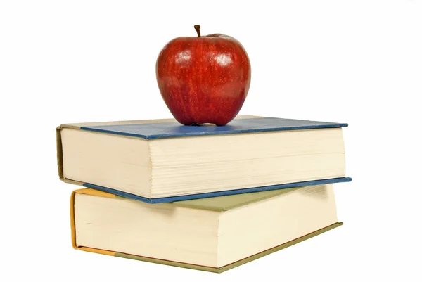 Short Stack of Books With Red Shiny Apple — стоковое фото