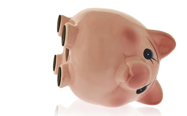 Piggy Bank en su lado mostrando vacío — Foto de Stock