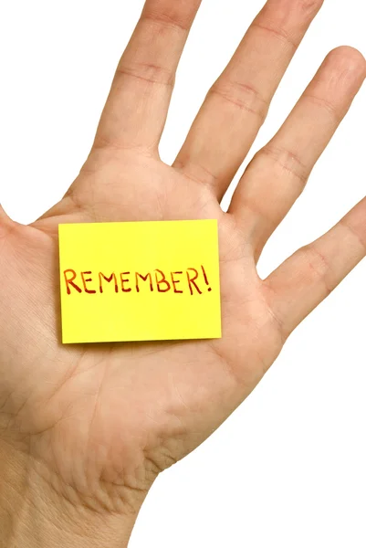 Little 'Remember' Note Stuck To Hand — Stock Photo, Image