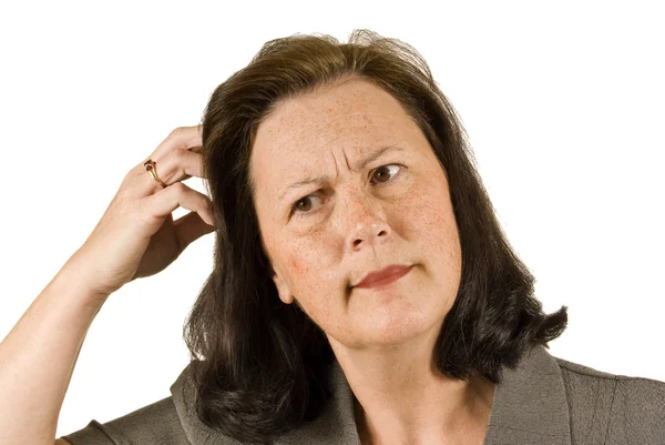 Mujer confusa arañándose la cabeza —  Fotos de Stock