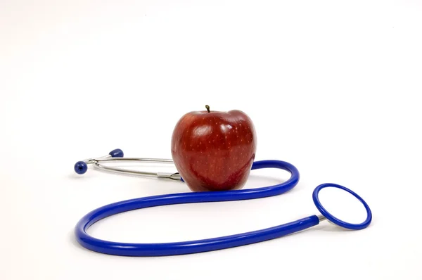 Red Apple With Blue Stethoscope — Stock Photo, Image