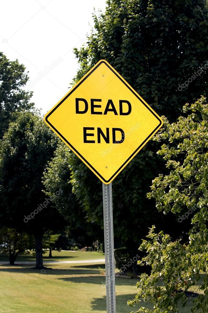 Dead End Sign At The End Of Road