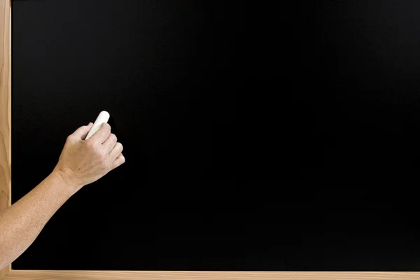 Hand Ready to Write On Blank Chalkboard — Stock fotografie