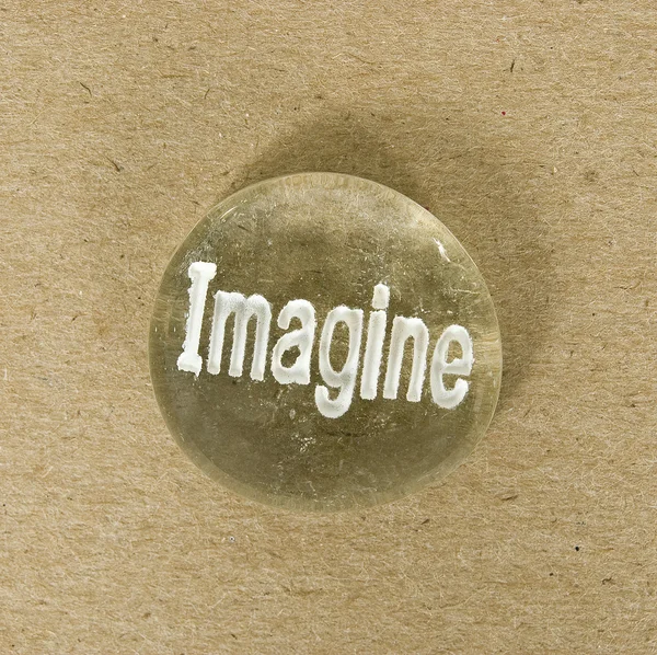 Imagine Encouragement Stone On Cream Colored Background — Stock Photo, Image