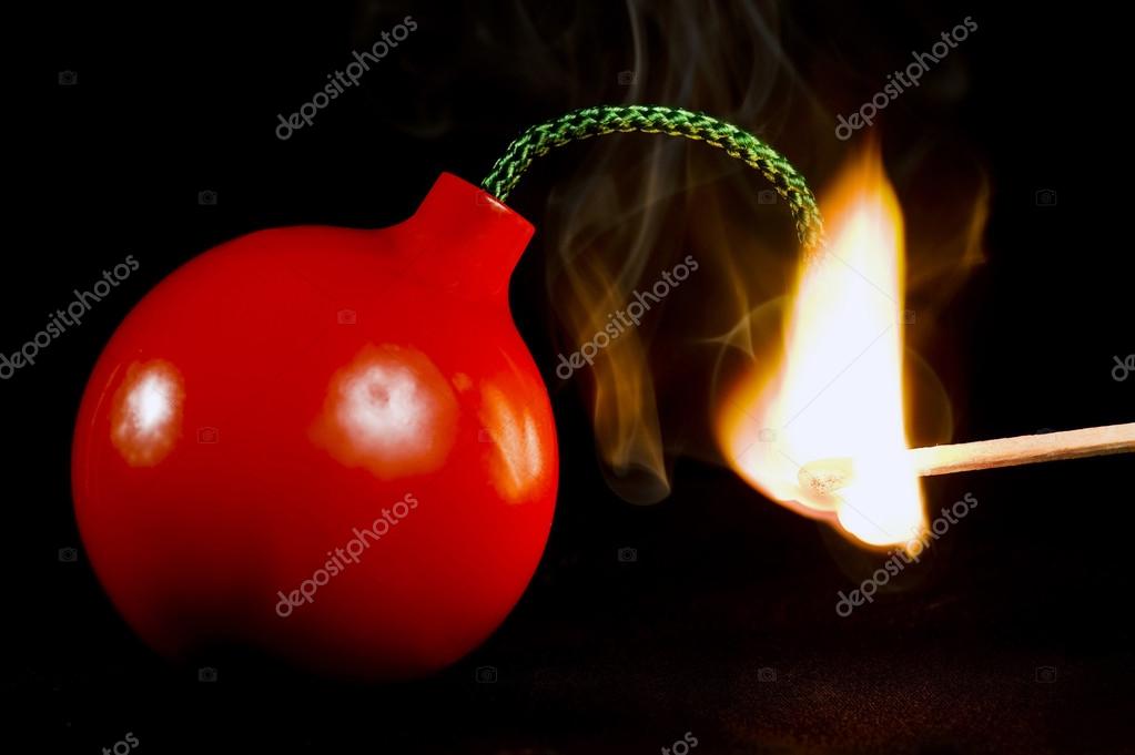 Flaming Match Lighting Fuse To A Bomb — Stock Photo © whitestar1955