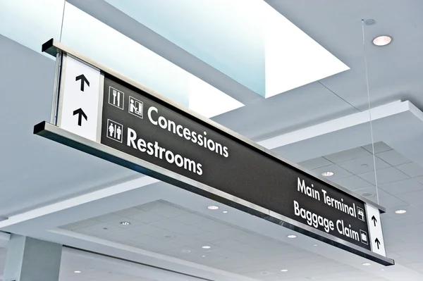 Airport Sign With Information And Baggage Claim At Airport Terminal — Stock Photo, Image