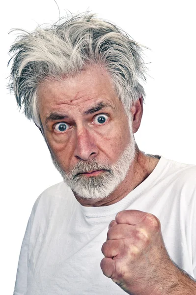 Verrückter alter Mann mit der Faust in der Hand — Stockfoto