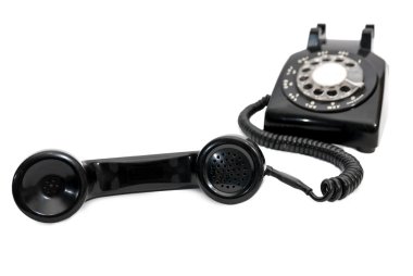 Siyah çevirmeli telefon alıcısı odak ile