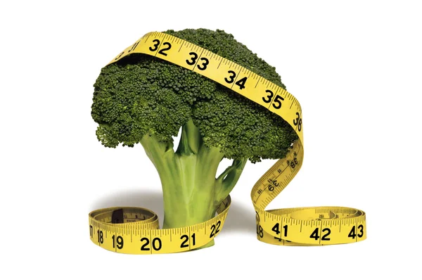 Broccoli With Yellow Tape Measure On White — Stock Photo, Image