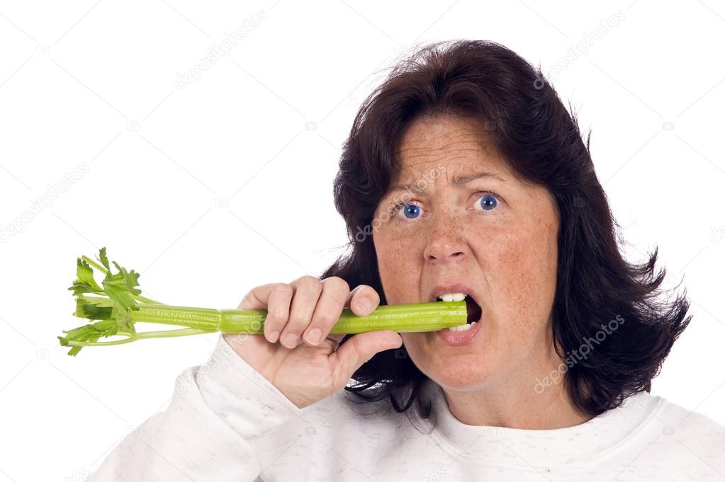 Woman Unhappy At Eating Healthy Celery