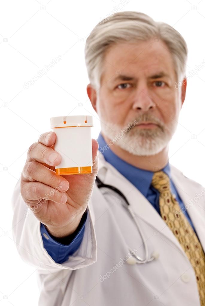 Doctor Holding Out Medicine Bottle