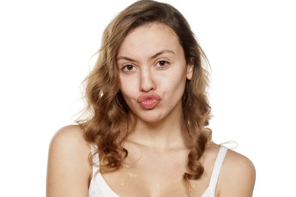 Kobieta z zaciśnięte usta — Zdjęcie stockowe
