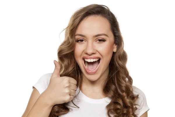 Girl showing thumb up — Stock Photo, Image