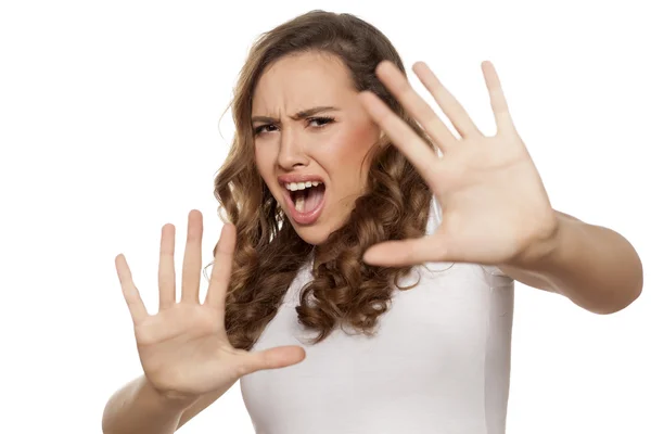 Girl in a defensive position — Stock Photo, Image