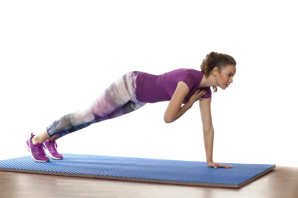 Hermosa chica haciendo ejercicio — Foto de Stock