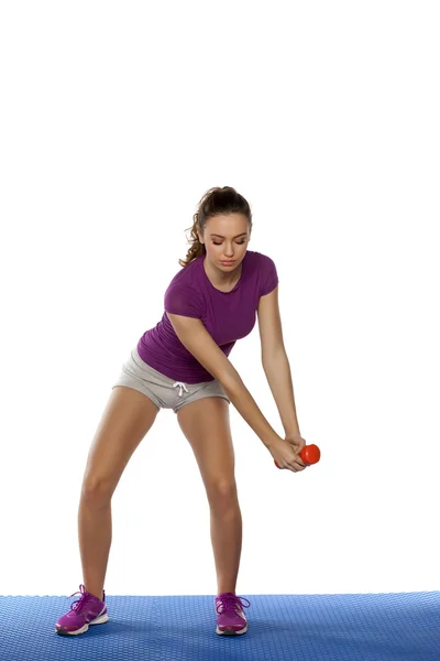 Chica haciendo ejercicio con peso — Foto de Stock