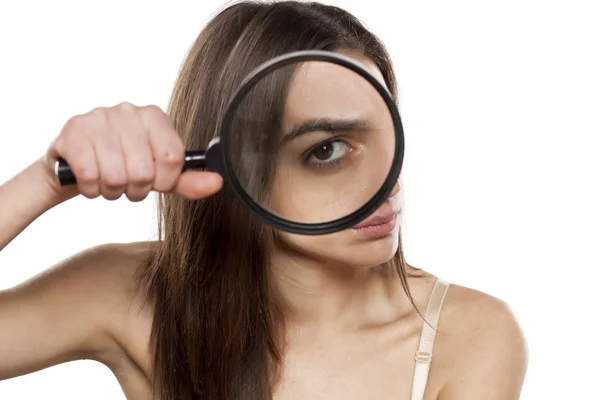 Suspicious young woman — Stock Photo, Image