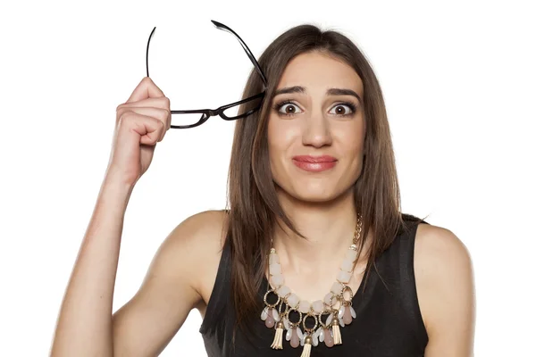 Verwarde vrouw met bril — Stockfoto